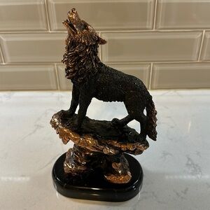 Sampson Howling Wolf on a Rock